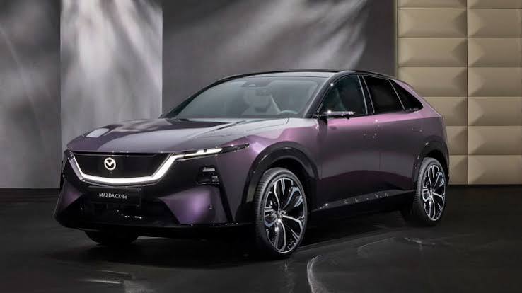 Model: Mazda CX-6e (previewed as the Mazda Arata concept / EZ-60)  Year: 2026